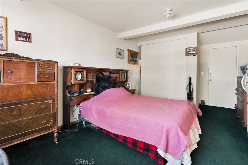 5335 Palmdale Road Phelan, CA 92371 - Photo 18 of 37 a bedroom with a bed and a closet