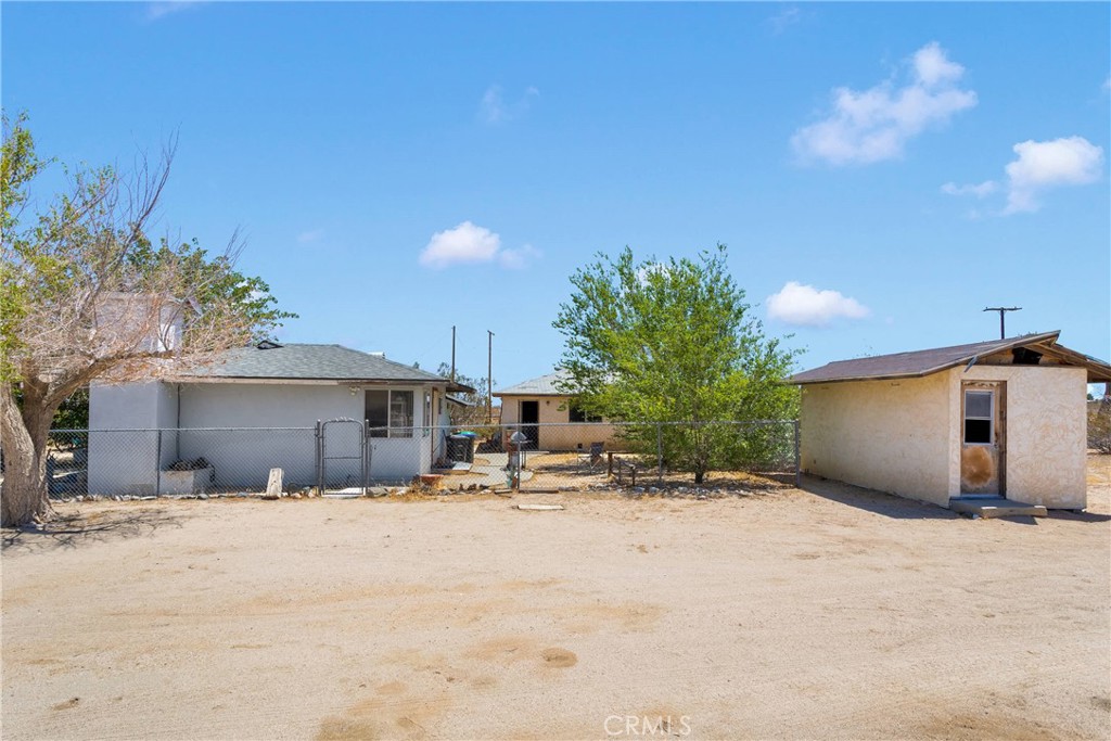 5335 Palmdale Road Phelan, CA 92371 - Photo 19 of 37 a view of a house with a snow in front of house