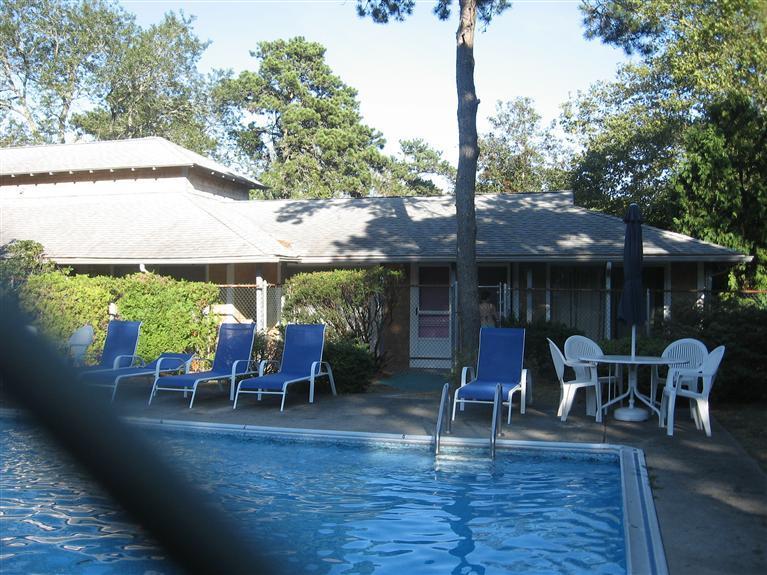 126 Lower County Road, Unit 6 Dennis Port, MA 02639 - Photo 11 of 12 an outdoor space with furniture for seating