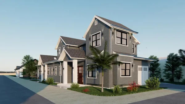 a front view of a house with a yard