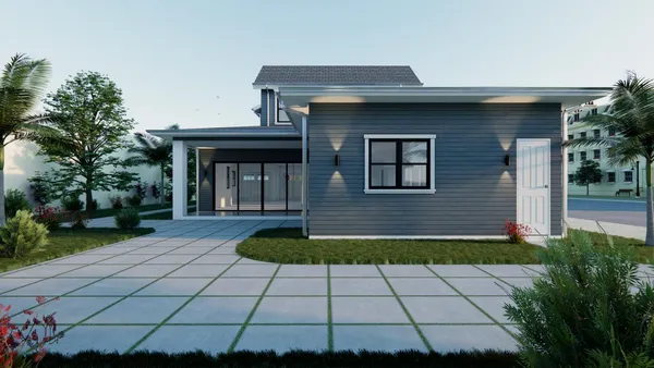 a front view of a house with garden