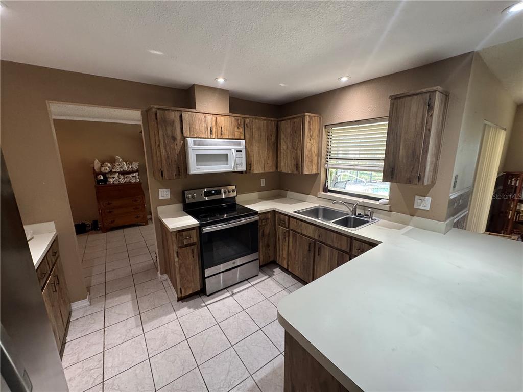 2148 Waterfall Drive Spring Hill, FL 34608 - Photo 3 of 38