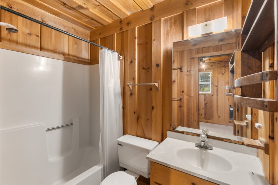 795 Buck Falls Road Highlands, NC 28741 - Photo 28 of 39 Private bedroom enjoys this attached full bathroom with LVP flooring