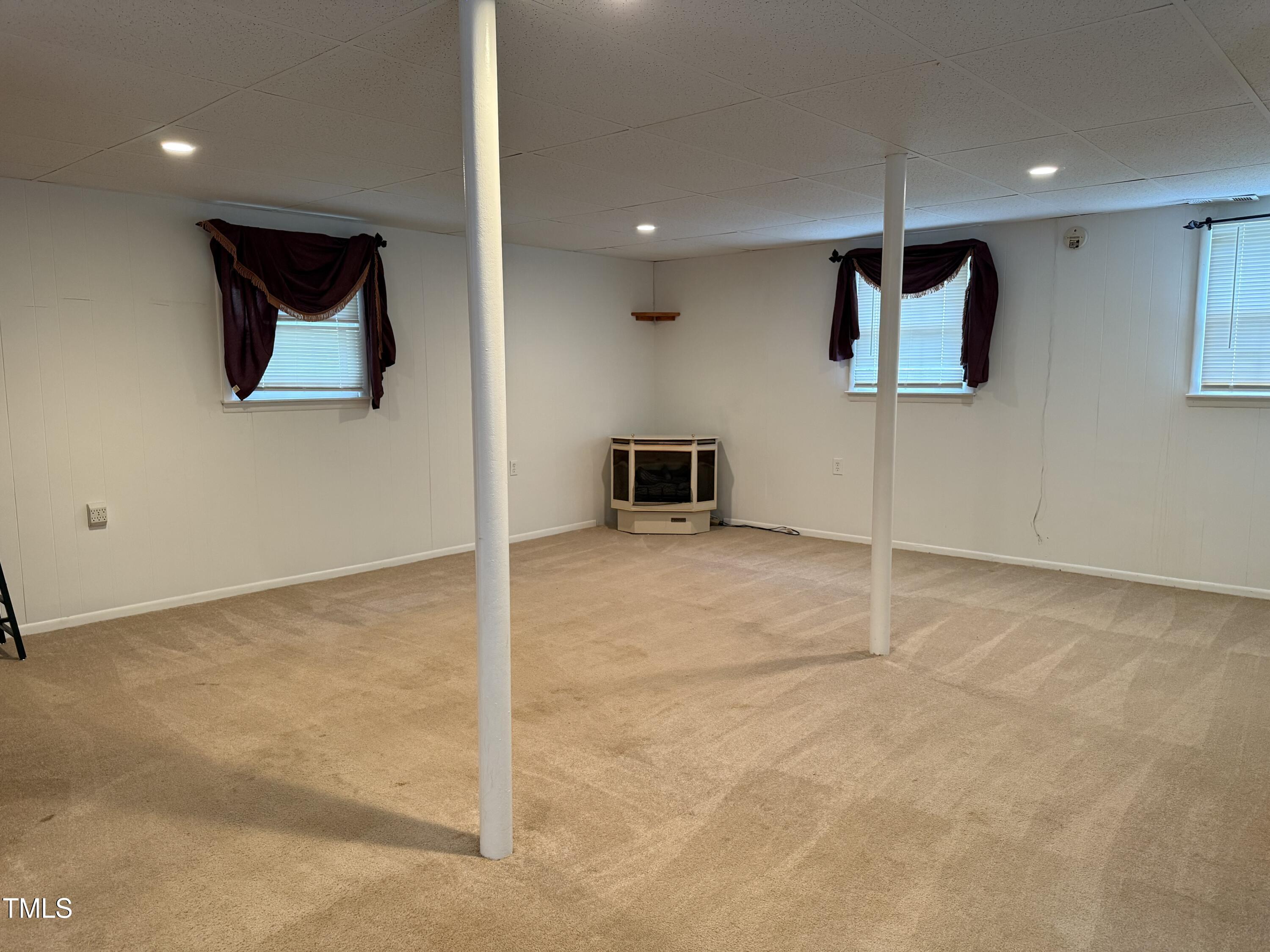 210 Crest Road Henderson, NC 27536 - Photo 10 of 23 basemt carpet side