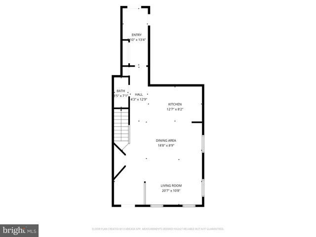 a picture of a bench in front of a white house