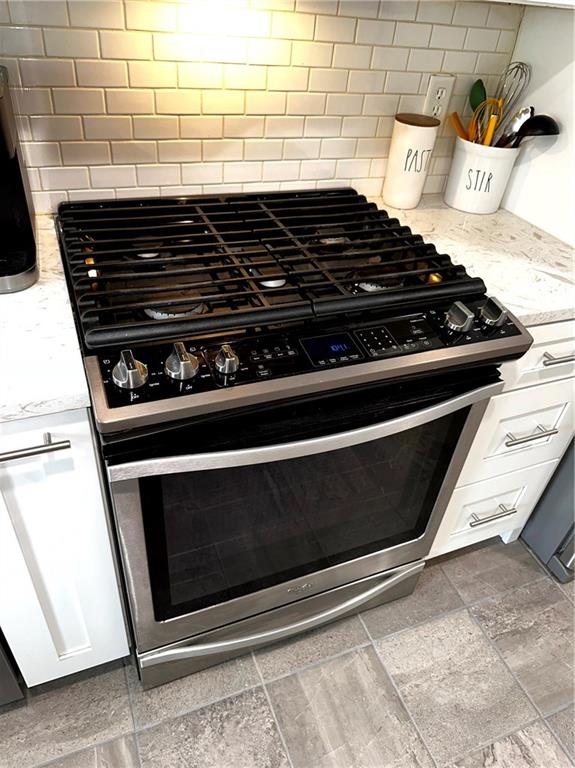 129 Ridge Road Pittsburgh, PA 15237 - Photo 16 of 35 a close up of stove top oven