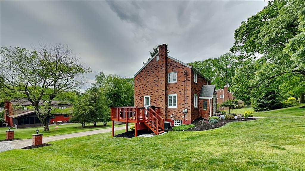 129 Ridge Road Pittsburgh, PA 15237 - Photo 28 of 35 a view of a house with a yard porch and sitting area