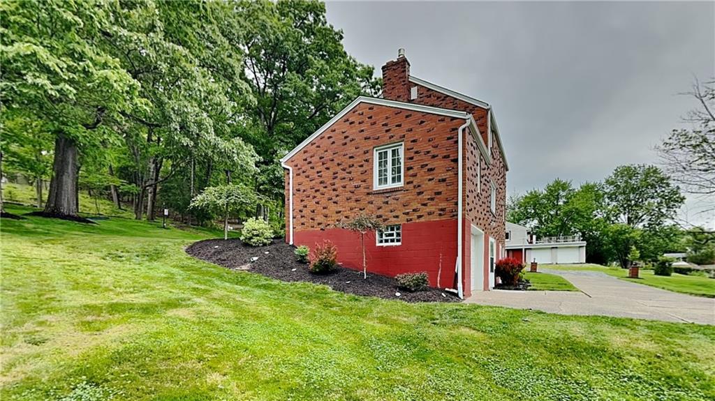 129 Ridge Road Pittsburgh, PA 15237 - Photo 31 of 35 a building with trees in the background