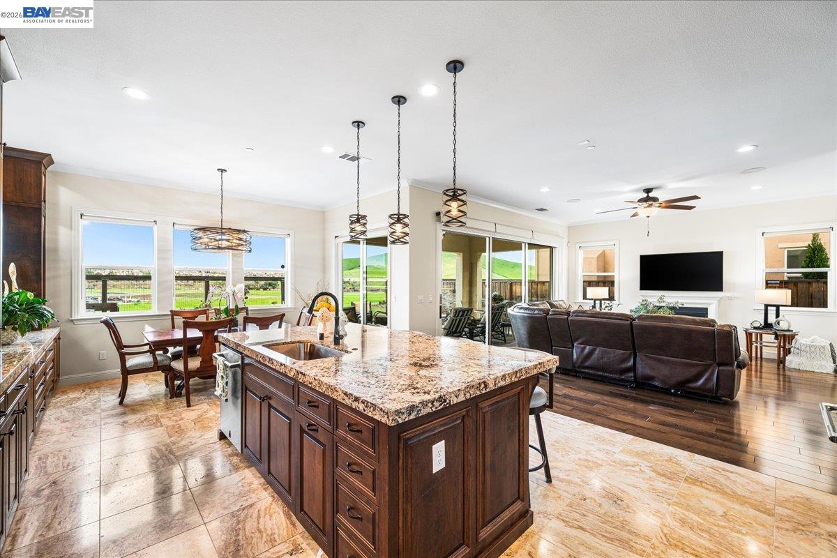 205 Zinnia Court San Ramon, CA 94582 - Photo 13 of 40 a living room with furniture and a flat screen tv