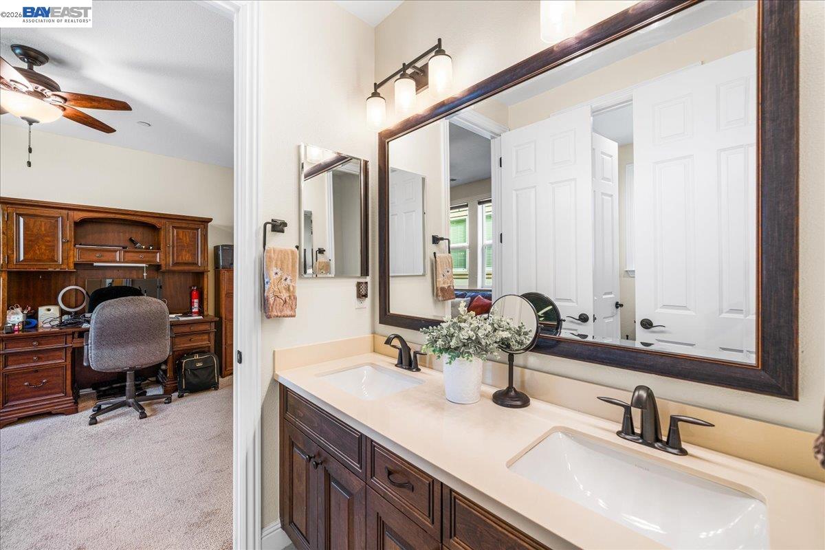 205 Zinnia Court San Ramon, CA 94582 - Photo 31 of 40 a bathroom with a sink double vanity and a mirror