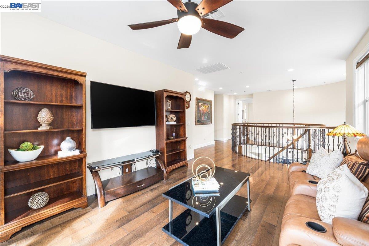 205 Zinnia Court San Ramon, CA 94582 - Photo 34 of 40 a living room with furniture and a flat screen tv