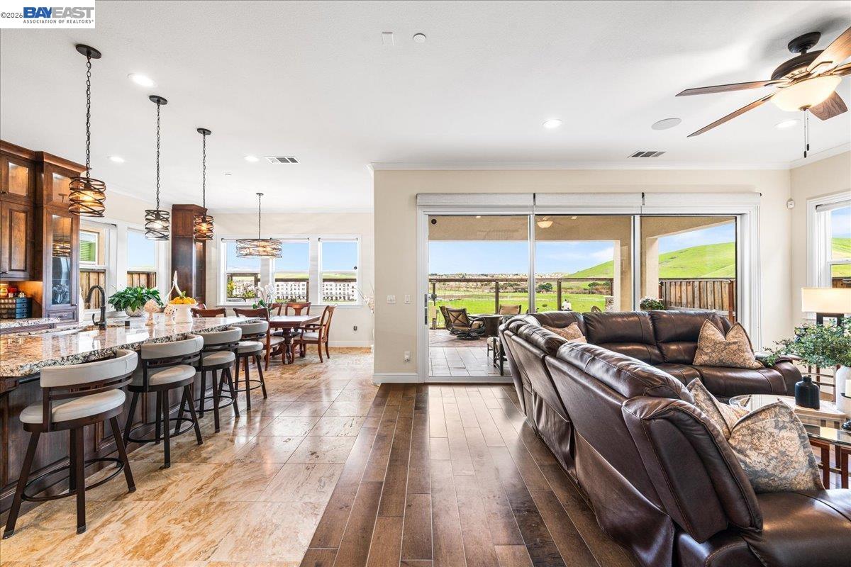 205 Zinnia Court San Ramon, CA 94582 - Photo 10 of 40 a living room with furniture large windows and wooden floor