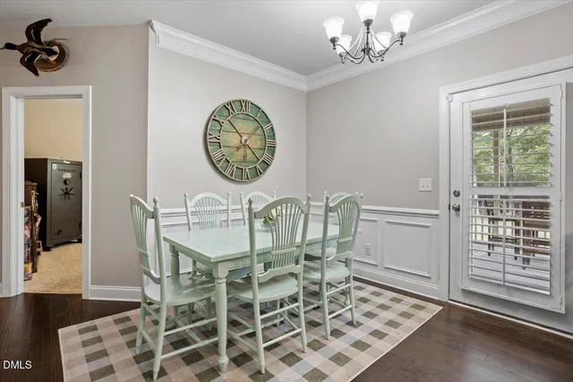 a bathroom with a sink a light fixture and a mirror