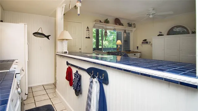 a kitchen with a stove and a microwave