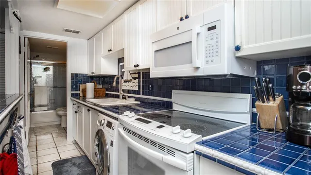 a large white building with black and white walls