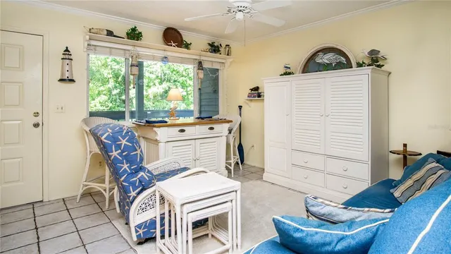 a view of a swimming pool with a patio and a yard