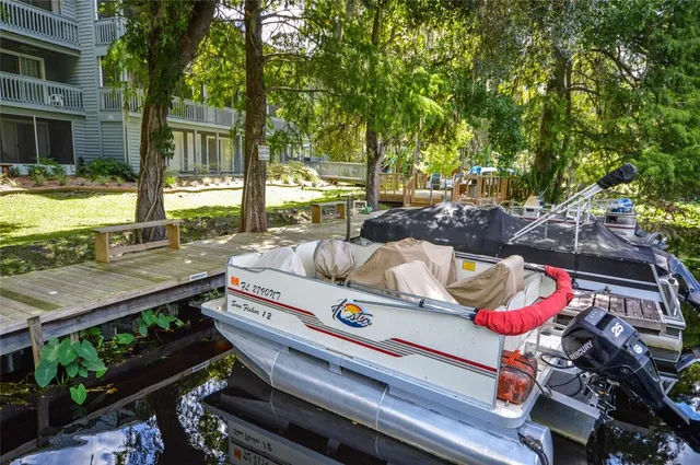 a view of swimming pool with outdoor seating