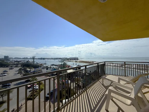 a view of a two chairs on the roof deck