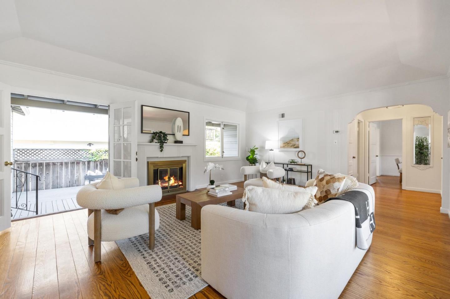 1820 Broadway Burlingame, CA 94010 - Photo 13 of 55 a living room with fireplace furniture and a wooden floor