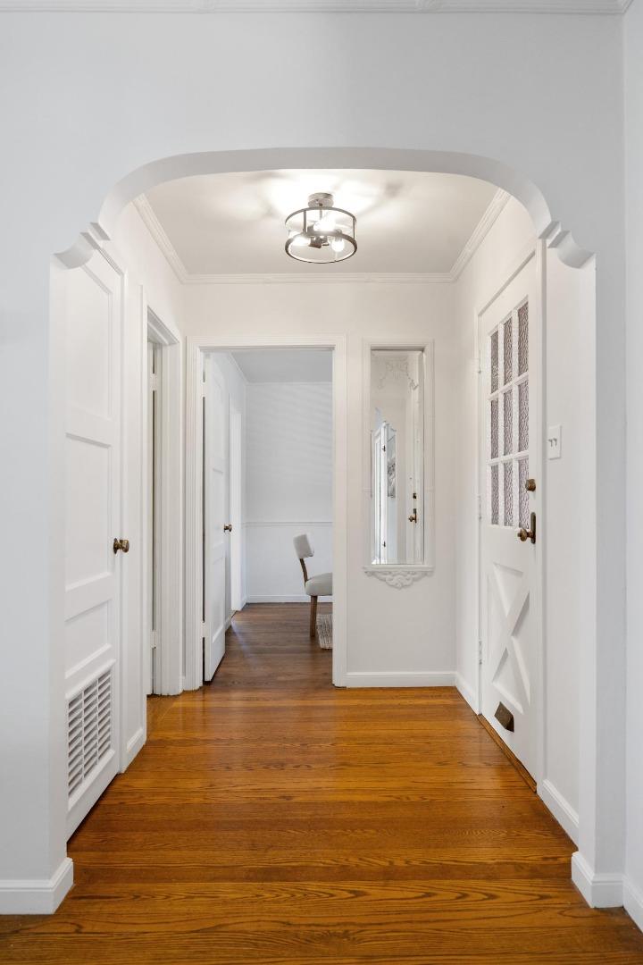 1820 Broadway Burlingame, CA 94010 - Photo 16 of 55 a bedroom with a bed and wooden floor