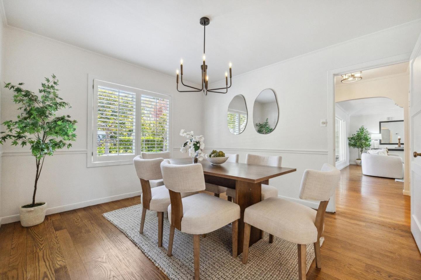 1820 Broadway Burlingame, CA 94010 - Photo 18 of 55 a view of a dining room with furniture window and wooden floor