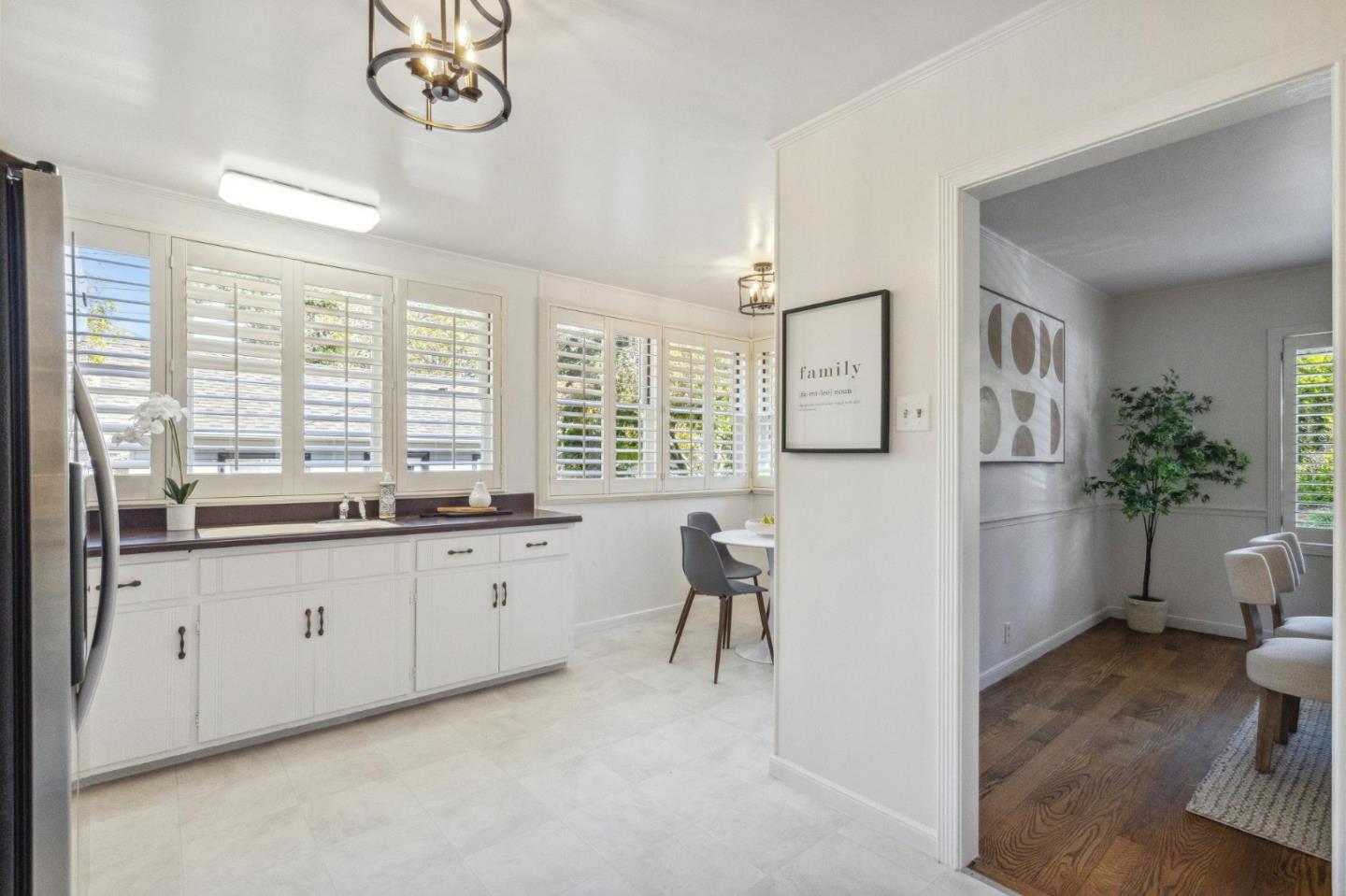 1820 Broadway Burlingame, CA 94010 - Photo 23 of 55 a large white kitchen with a large window