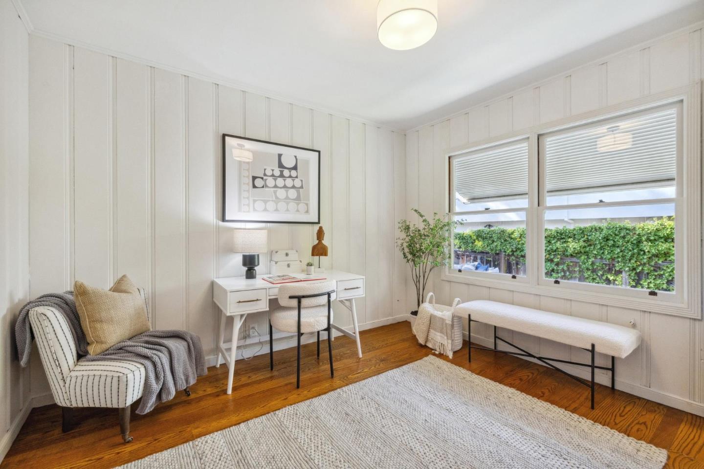 1820 Broadway Burlingame, CA 94010 - Photo 28 of 55 a living room with furniture and a large window
