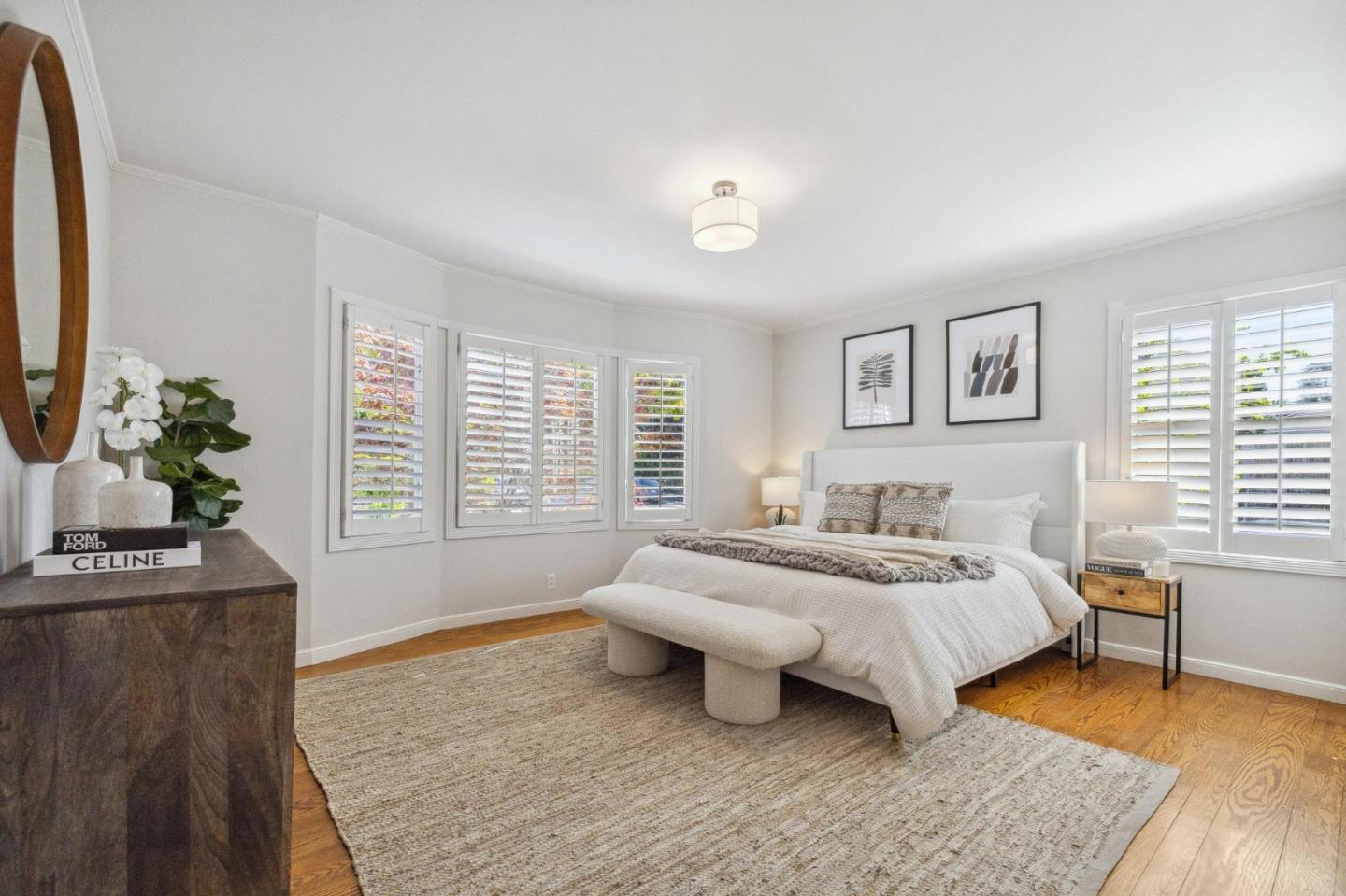 1820 Broadway Burlingame, CA 94010 - Photo 34 of 55 a spacious bedroom with a bed and a table in it