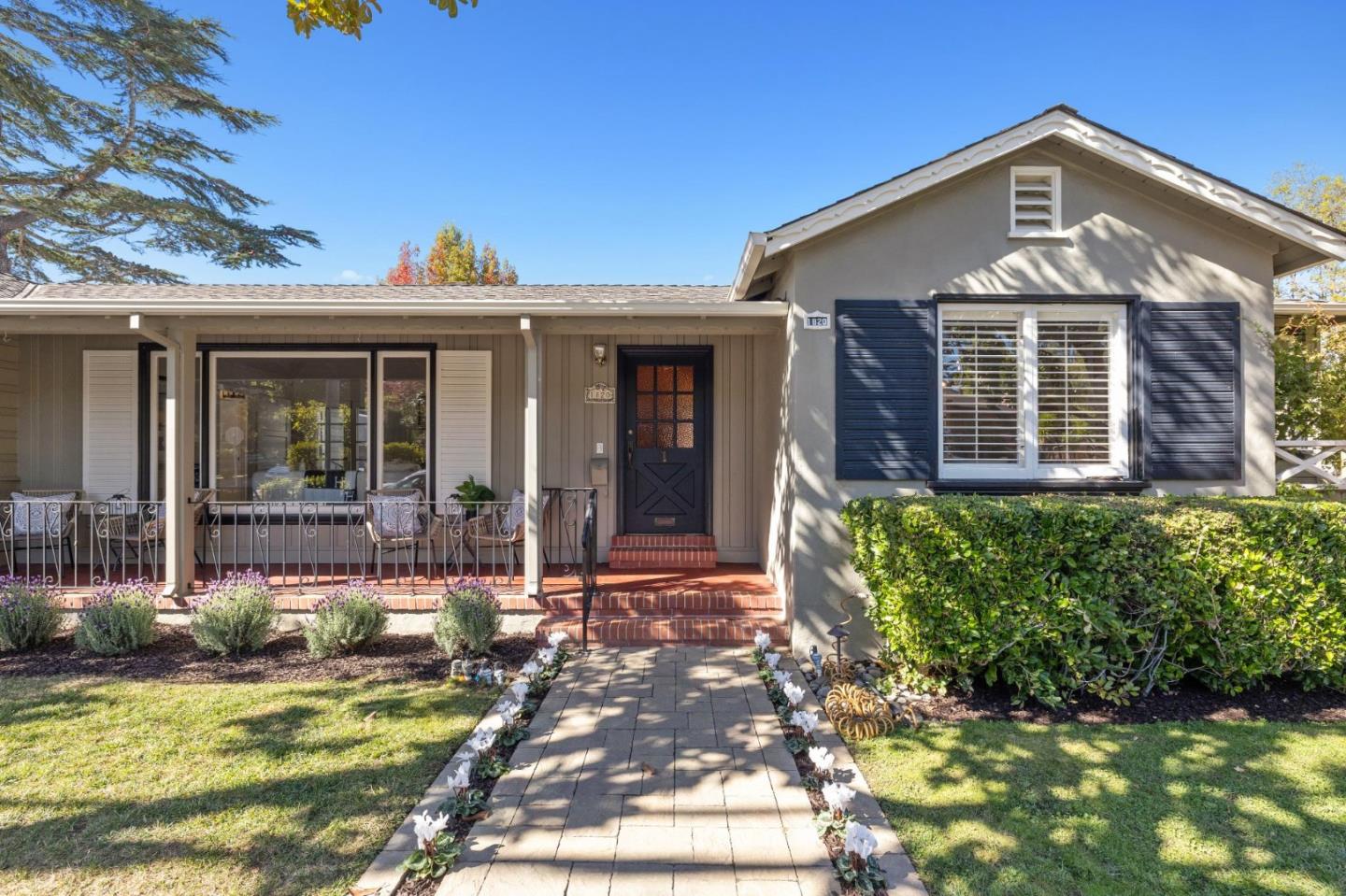 1820 Broadway Burlingame, CA 94010 - Photo 4 of 55 a front view of a house with a yard