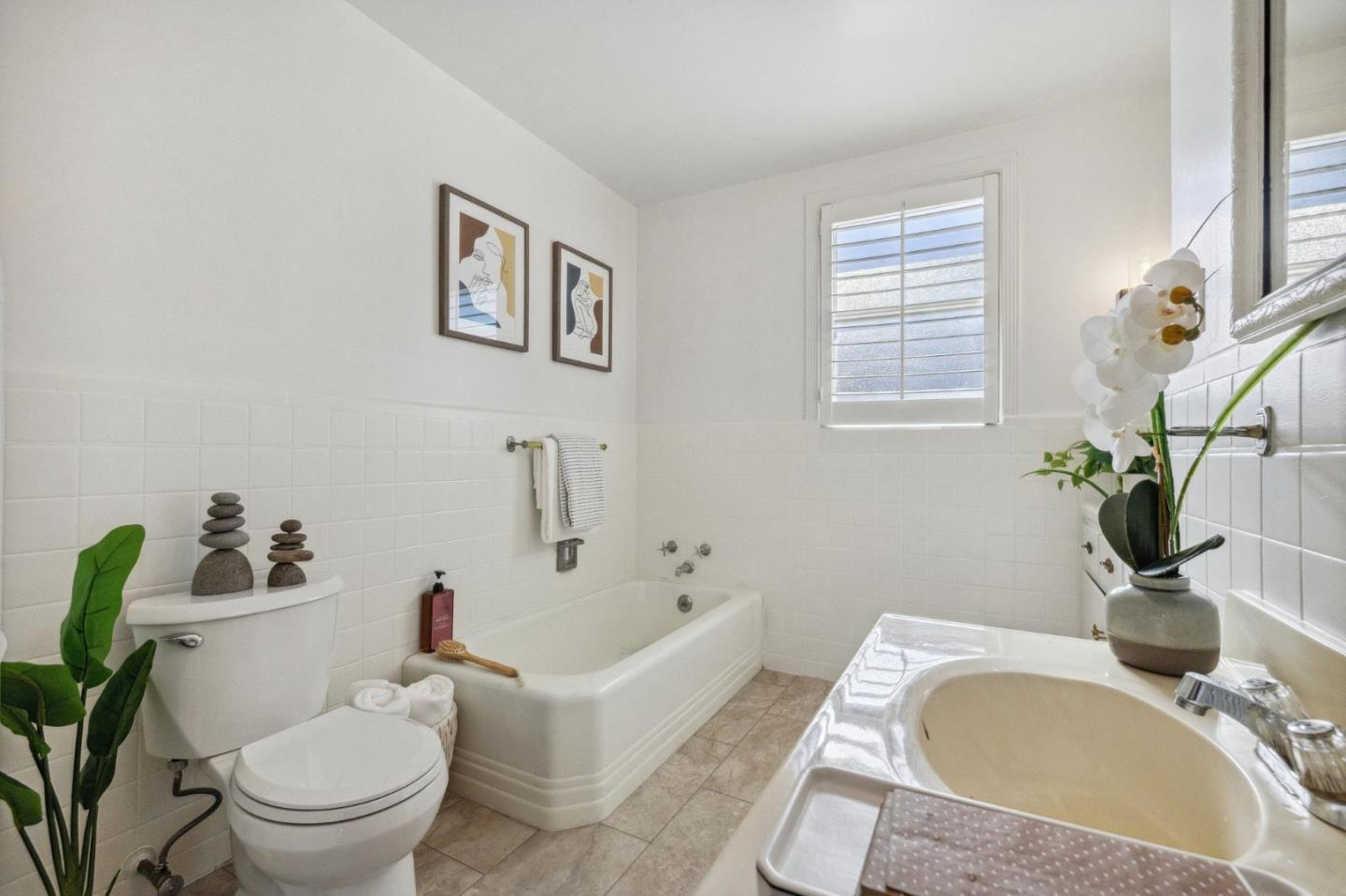 1820 Broadway Burlingame, CA 94010 - Photo 42 of 55 a bath room with a toilet and a sink