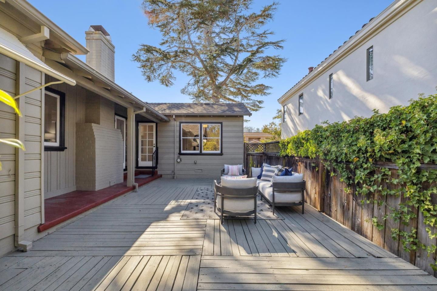 1820 Broadway Burlingame, CA 94010 - Photo 50 of 55 a view of a patio with couches table and chairs and potted plants