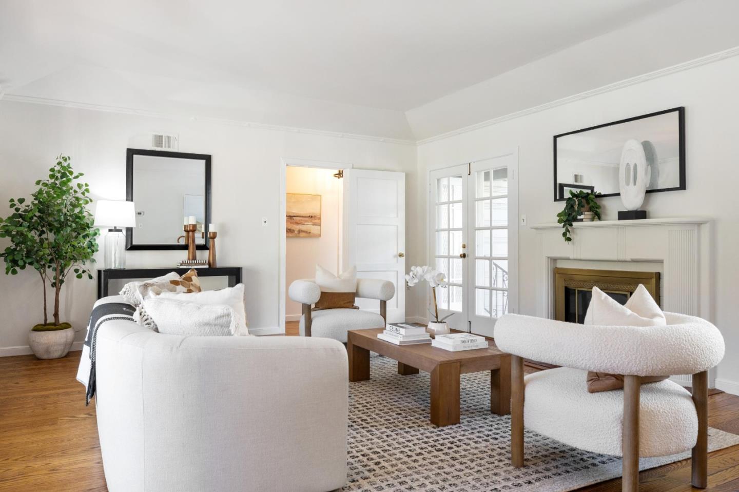 1820 Broadway Burlingame, CA 94010 - Photo 10 of 55 a living room with furniture a large window and a fireplace
