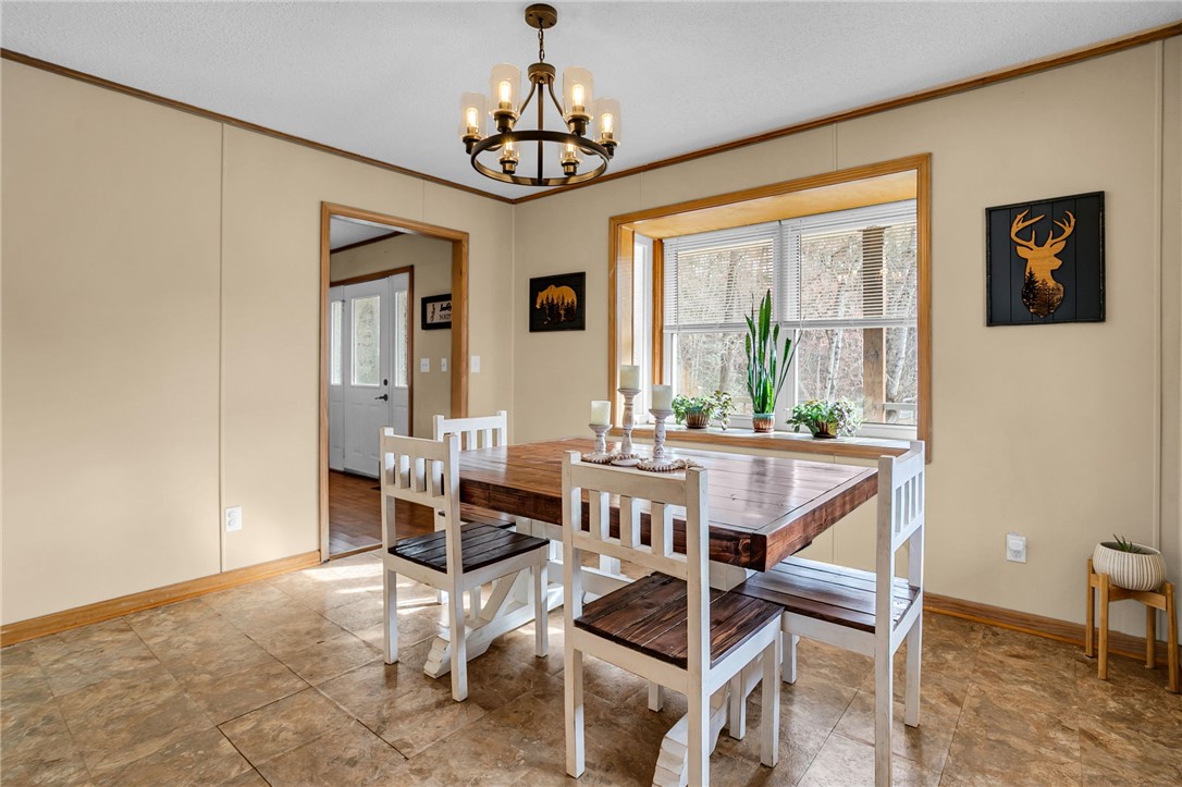 130 Greenbrier Road Salem, SC 29676 - Photo 7 of 48 This cozy dining area features warm lighting and ample natural light, perfect for intimate meals.