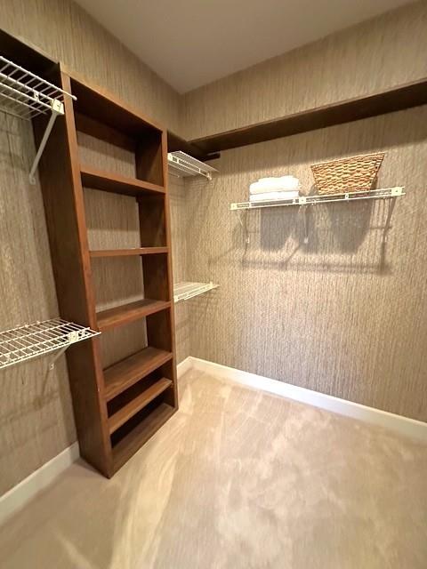 7155 Roswell Road, Unit 40 Sandy Springs, GA 30328 - Photo 19 of 42 a view of walk in closet with empty racks