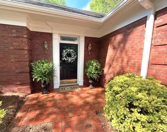 a view of a entryway door front of house