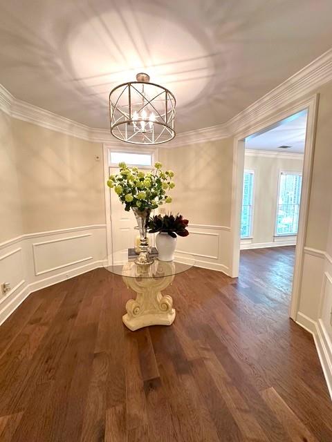 7155 Roswell Road, Unit 40 Sandy Springs, GA 30328 - Photo 4 of 42 a view of dining room with wooden floor
