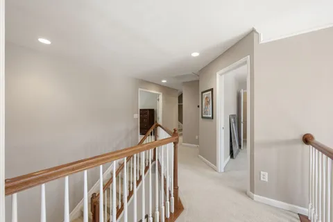 a view of a hallway with closet area
