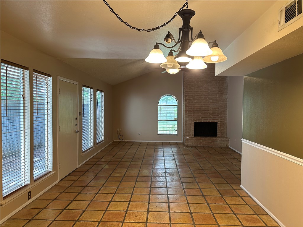 4032 Ogrady Drive Corpus Christi, TX 78413 - Photo 5 of 18 a view of a livingroom with a chandelier fan and windows