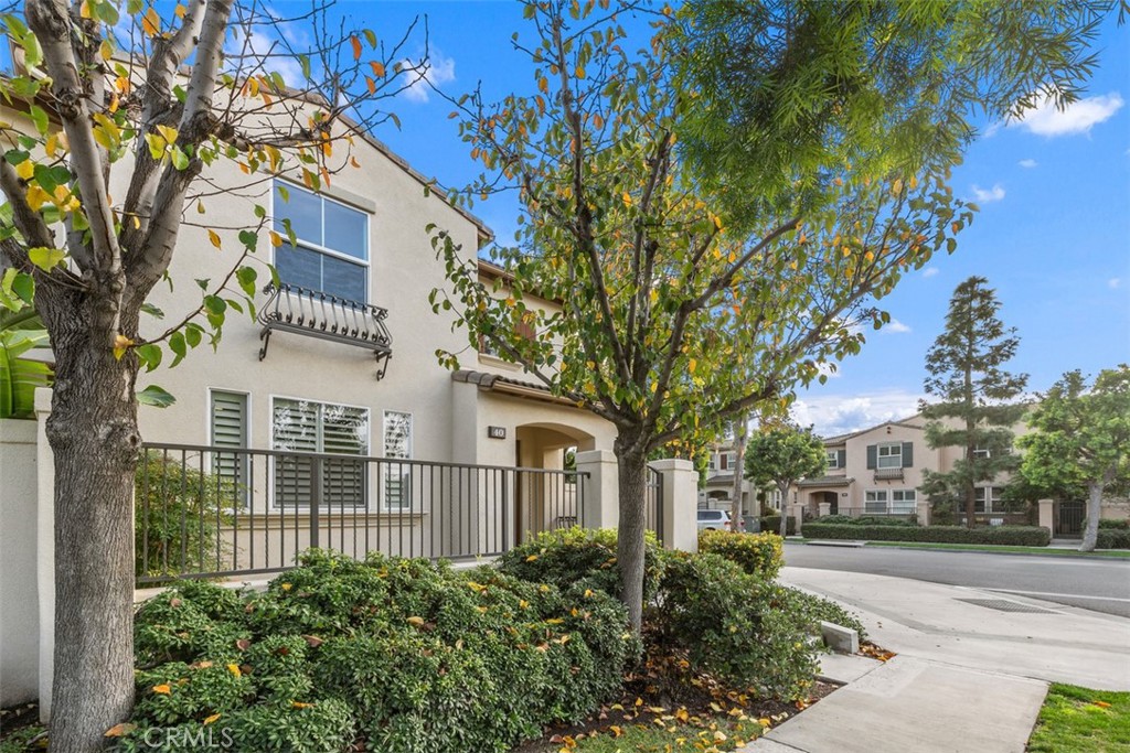 40 League Irvine, CA 92602 - Photo 2 of 38 front view of a house with a garden