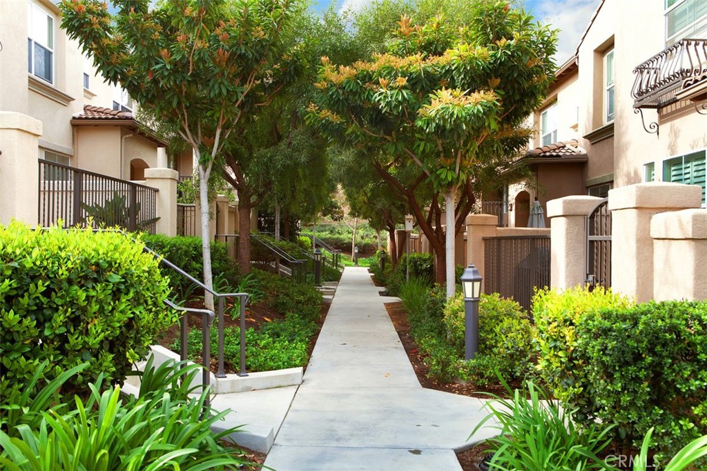 40 League Irvine, CA 92602 - Photo 26 of 38 a view of a pathway with house on both side