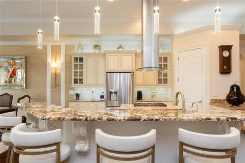 a bathroom with a tub and shower
