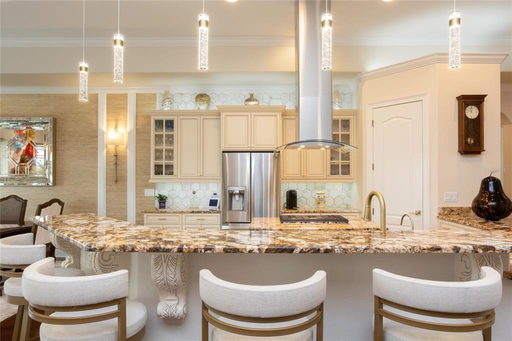 105 Wimbledon Court Redington Shores, FL 33708 - Photo 21 of 64 a bathroom with a granite countertop sink and a mirror