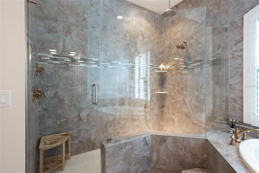 105 Wimbledon Court Redington Shores, FL 33708 - Photo 27 of 64 a bathroom with a shower
