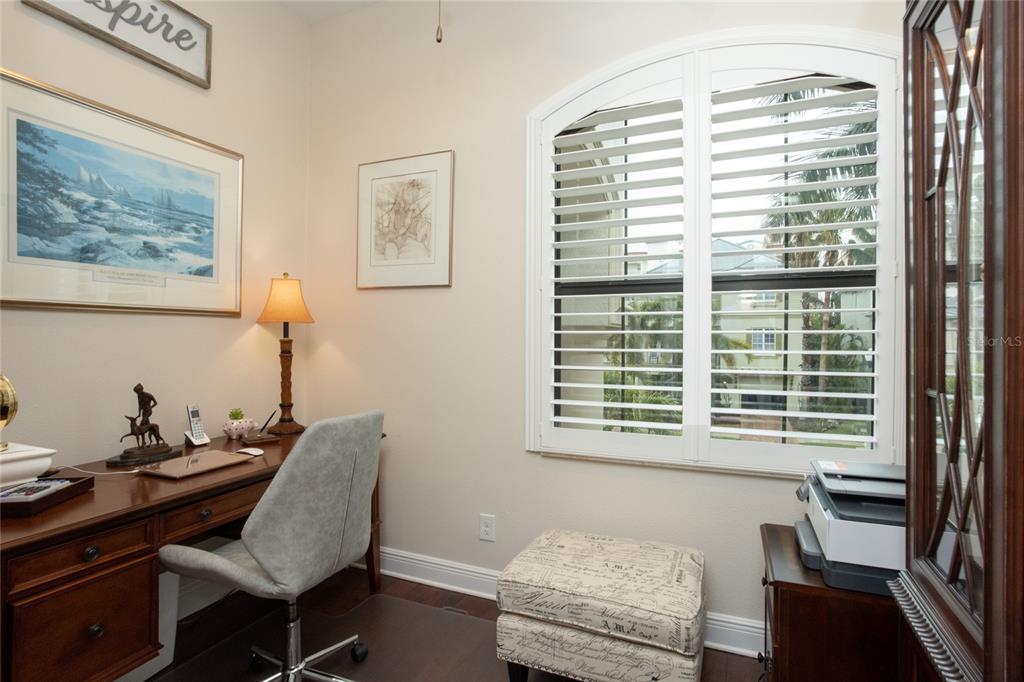 105 Wimbledon Court Redington Shores, FL 33708 - Photo 33 of 64 a living room with furniture and a window