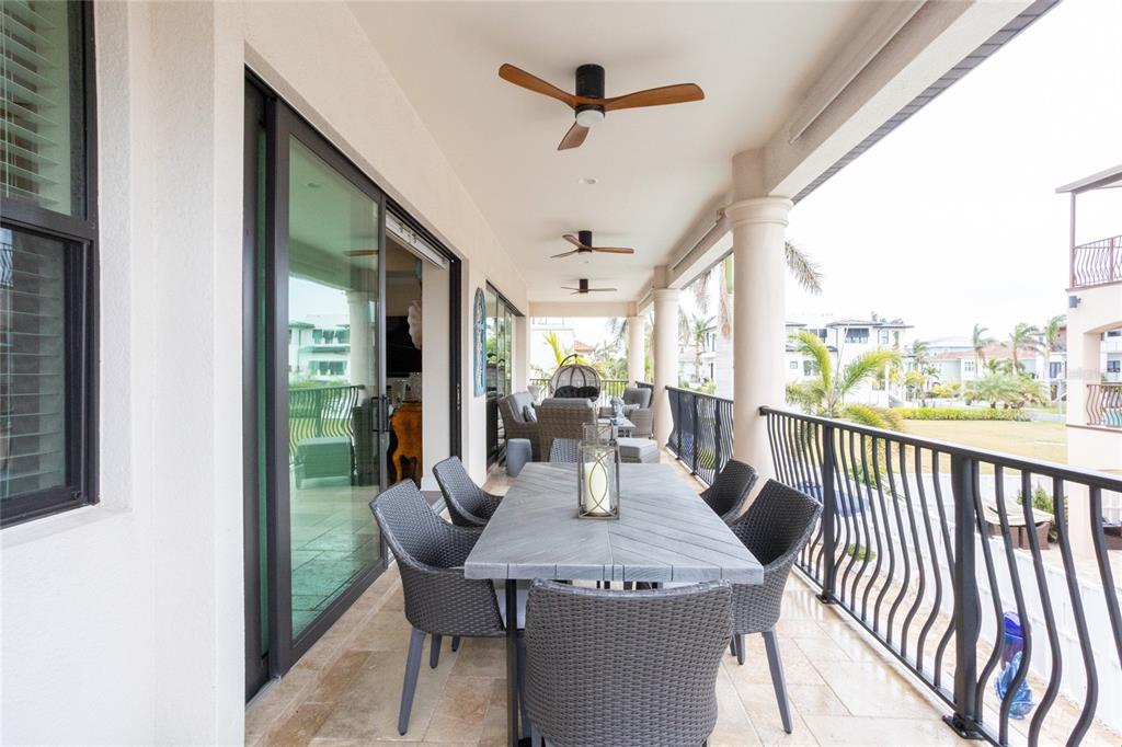 105 Wimbledon Court Redington Shores, FL 33708 - Photo 47 of 64 a view of a dining room with furniture window and outside view