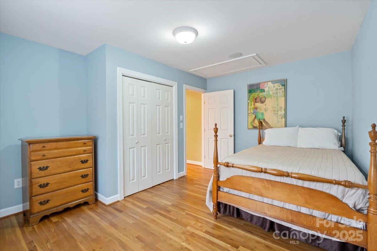 4594 Grandin Road Lenoir, NC 28645 - Photo 19 of 44 a bedroom with a bed and a dresser