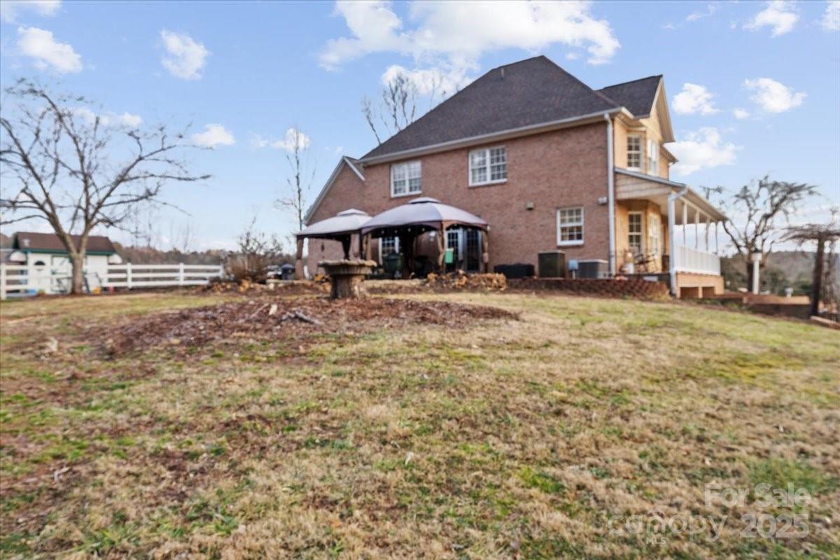 4594 Grandin Road Lenoir, NC 28645 - Photo 36 of 44 a front view of a house with a yard