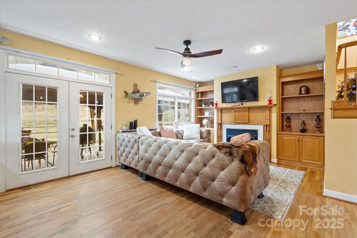 4594 Grandin Road Lenoir, NC 28645 - Photo 10 of 44 a living room with furniture fireplace and a flat screen tv