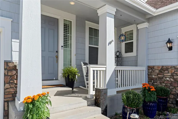 a view of a porch with furniture