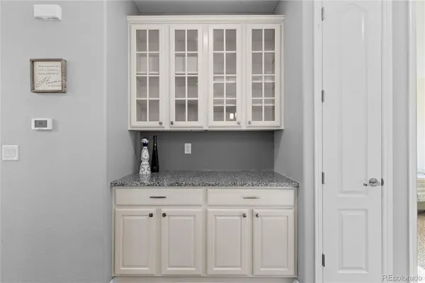 a view of cabinets and window